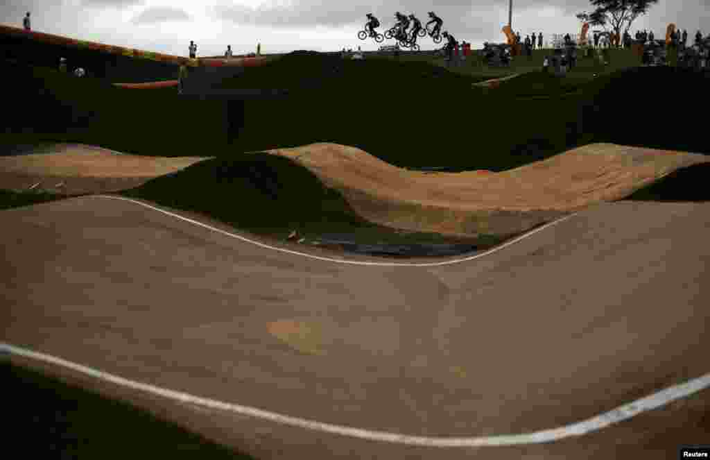 Competitors take part in the International BMX Cycling Challenge at the Rio 2016 Olympic Games BMX cycling track at the Deodoro Sports Complex in Rio de Janeiro, Brazil, Oct. 4, 2015.