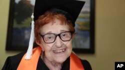 In this Dec. 10, 2018 photo, Janet Fein, 84, poses for a photo in Richardson, Texas. (AP Photo/LM Otero)