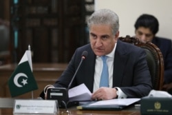 FILE - Pakistani Foreign Minister Shah Mehmood Qureshi speaks at a meeting in Islamabad, Pakistan, April 7, 2021.