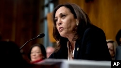 FILE - Sen. Kamala Harris, D-Calif., speaks as Attorney General William Barr testifies during a Senate Judiciary Committee hearing on the Mueller Report on Capitol Hill in Washington, May 1, 2019.
