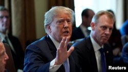 U.S. President Donald Trump holds a cabinet meeting at the White House in Washington, Apr. 9, 2018. 