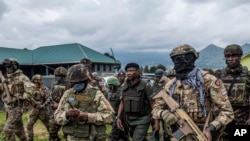 Waasi wa kundi la M23, tarehe 23, Desemba 2022. Picha na shirika la habari la AP /Moses Sawasawa. 