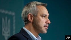 Ukraine's Prosecutor General Ruslan Ryaboshapka speaks to the media in Kyiv, Ukraine, Oct. 4, 2019.