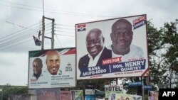 The campaign billboards of Ghana's two main political parties running in this year's national election are shown in the streets of Accra in Ghana, Oct. 8, 2016.