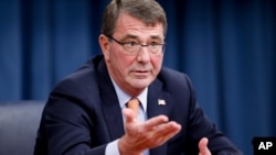 FILE - Defense Secretary Ashton Carter speaks during a news conference at the Pentagon, April 16, 2015. 