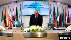 Secretary General Abdullah al-Badri arrives for news conference following meeting oil ministers at OPEC headquarters, Vienna, Dec. 4, 2013.