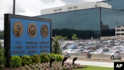 Batoul Bashir Ahmad, a five-month-old child suffering from dehydration, is carried by his mother, a displaced Iraqi woman who fled her home during a battle between Iraqi forces and Islamic State militants, in Mosul.