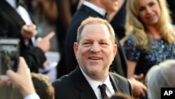 FILE - Harvey Weinstein arrives at the Oscars at the Dolby Theatre in Los Angeles, Feb. 28, 2016. 