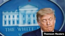 El presidente Donald Trump se dirige a los periodistas durante una comparecencia celebrada la Casa Blanca.