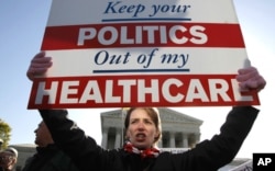 Vashingtonda prezident Obama qabul qilgan qonundan norozilar namoyishi. 2012-yil mart.