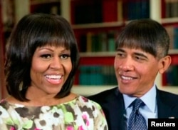 U.S. President Barack Obama makes light of his wife Michelle Obama's new bangs with a fake pictures of himself with the same hairdo in this photo created by the White House
