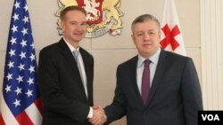 მაიკლ კარპენტერი და პრემიერი კვირიკაშვილი