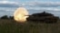 FILE - Ukrainian servicemen of the 21st Separate Mechanized Brigade fire a Leopard 2A6 tank during a military exercise, near a front line in Donetsk region, Ukraine, May 12, 2024. 