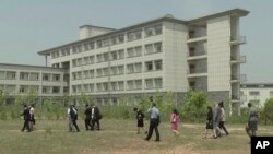 This image made from May 21, 2014, video shows a building at the Pyongyang University of Science and Technology. North Korea confirmed on Wednesday, May 3, 2017, the detention of American citizen Kim Sang Dok, who was referred to as Kim Sang-duk when Pyongyang University of Science and Technology, where he was teaching accounting, previously announced his detention. Kim's English name is Tony Kim. (AP Photo)