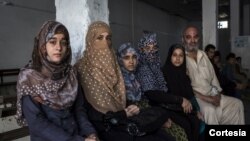 Los cerca de cuatro mil refugiados afganos que llegaran a Colombia provienen de Alemania, Italia y Emiratos Árabes, países donde fueron trasladados de urgencia en aviones militares de Estados Unidos. [Foto Cortesía ACNUR]. 