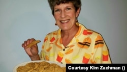 Author Kim Zachman shows the peanut butter cookies from her book There's No Ham in Hamburgers.