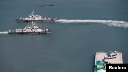 FILE - A South Korean coast guard vessel approaches a pier in Jindo.