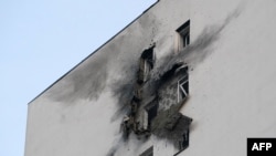 3月11日，俄羅斯莫斯科南部薩普羅諾沃一處住宅區內的住宅大樓在無人機襲擊後受損。