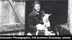 Virginia Hall holding lambs in her disguise as a farm worker. Courtesy CIA.