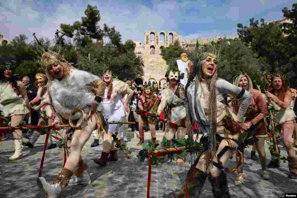 Revelers participate in "Falliforia" carnival, inspired by Dionysus, the Ancient Greek god of wine and festivity, in Athens, Greece.