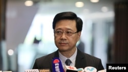Secretary of Security John Lee Ka-Chiu announces the withdrawal of the extradition bill, in Hong Kong, China, Oct. 23, 2019. 
