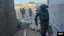 Slika koju je izraelska vojska objavila 7. novembra 2023. prikazuje trupe tokom operacija u sjevernoj Gazi. (Fotografija Izraelske vojske / AFP)