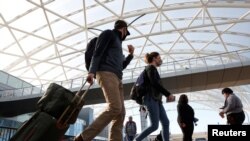 Putnici na aerodromu u Atlanti, Džordžiji