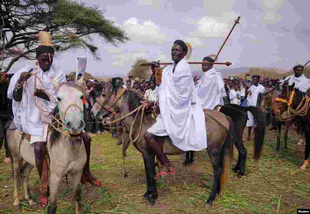 The newly named 72nd Borana Pastoralist chief, 'Aba Gada' Guyo Wariyo, 37, rides a horse during his swearing ceremony in Arero, Ethiopia.