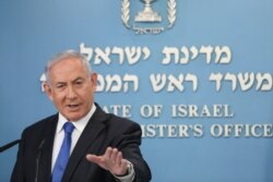 Israel's Prime Minister Benjamin Netanyahu announces full diplomatic ties will be established with the United Arab Emirates, during a news conference on Thursday, Aug. 13, 2020 in Jerusalem.