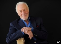 FILE - Christopher Plummer poses for a portrait at the Beverly Hilton Hotel in Beverly Hills, California, July 25, 2013.