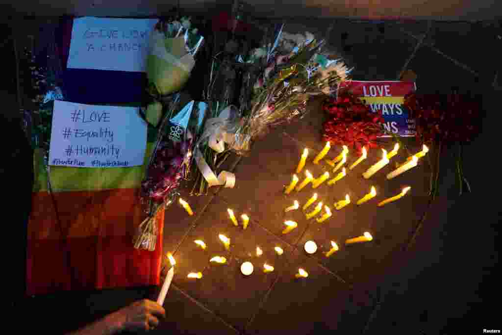 A candlelight vigil in memory of the victims of Pulse Orlando shooting at the U.S. Embassy in Bangkok, Thailand, June 13, 2016.