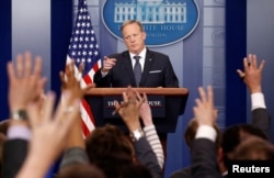 FILE - White House Press Secretary Sean Spicer takes a question during a press briefing at the White House.