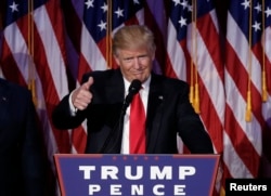 U.S. President-elect Donald Trump greets supporters during his election night rally in Manhattan, New York, Nov. 9, 2016.