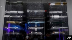 FILE - A section displaying replica of various types of missiles used by the Chinese military, is seen at the Military Museum in Beijing, China, Aug. 1, 2019.