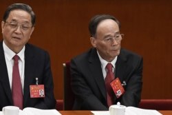 2017年10月18日，中纪委书记和政治局常委王岐山和政治局常委俞正声（左）在中国共产党第十九次全国代表大会开幕式上。