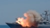 ARCHIVES - Un cuirassé de la marine russe tire des missiles lors d'une répétition du défilé de la Journée de la marine russe à Sébastopol, en Crimée, le vendredi 24 juillet 2015.