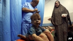 Ranjeni Palestinac u bolnici (Foto:AP/Abed Khaled)