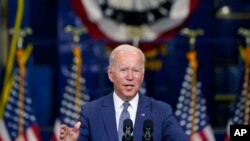 FILE - President Joe Biden delivers remarks at NJ Transit Meadowlands Maintenance Complex to promote his "Build Back Better" agenda, in Kearny, N.J., Oct. 25, 2021.
