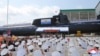 Foto divulgada por la agencia de prensa norcoreana KCNA muestra la presentación el 6 de septiembre de 2023de un nuevo submarino en un lugar no revelado de Corea del Norte.