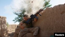 Hilmand, Afg'oniston. 11-sentabr xurujidan keyin Amerika askarlari soni 570 mingga oshgan edi. Endi 440-450 mingga tushadi.