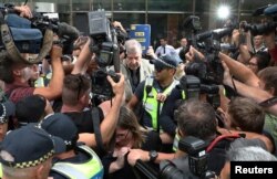 Catholic Cardinal George Pell is seen leaving the County Court in Melbourne, Australia, February 26. 2019. Picture taken February 26, 2019. AAP Image/David Crosling/via REUTERS