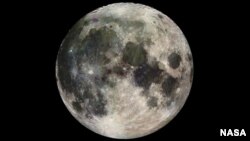 FILE - The Galileo spacecraft sent back this image of the Moon as it headed into the outer solar system. 