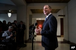FILE - Rep. Adam Schiff, chairman of the House Intelligence Committee, talks to reporters at the Capitol in Washington, March 6, 2019.