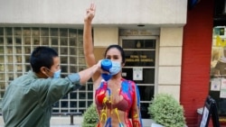 Thai self-exiled refugee Nachacha Kongudom participates in symbolic art performance to call for justice for forced disapperances of Thai activists during a protest in front of Royal Thai Consulate General New York on September 19, 2020