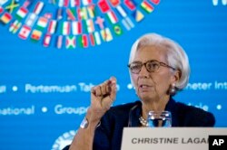 FILE - Managing Director of International Monetary Fund (IMF) Christine Lagarde talks during a press conference ahead of the annual meetings of the IMF and World Bank in Bali, Indonesia, Oct. 11, 2018.