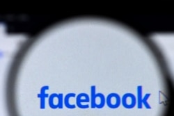 Facebook logo is pictured on a laptop screen in Moscow on August 26, 2021. (AFP)