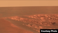 A view of the surface of Mars taken at the "Intrepid" crater by the Opportunity Mars Rover on November 11, 2010. Humans could see this landscape with their own eyes by the 2030s. (NASA)