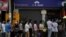 FILE - People line up outside a bank branch in Yangon, Myanmar, Feb. 1, 2021.