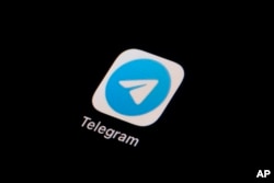 FILE - The icon for the instant messaging Telegram app is seen on a smartphone, Tuesday, Feb. 28, 2023.