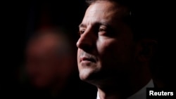 Ukraine's President Volodymyr Zelenskiy attends a luncheon for world leaders at the 74th session of the United Nations General Assembly at U.N. headquarters in New York, Sept. 24, 2019.